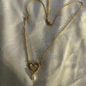 Gold necklace, heart and pearl